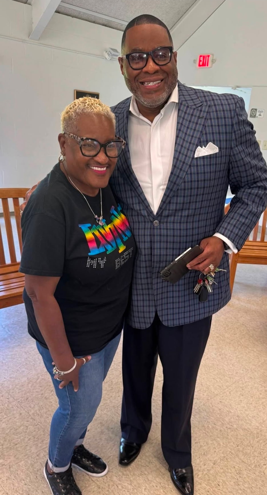 Pastor Sheppard greeting a member after service